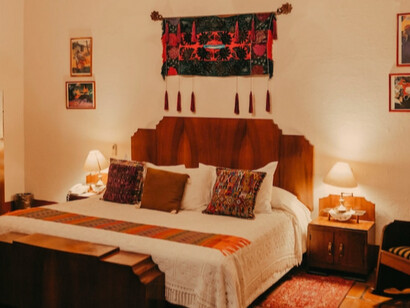 The flooring is made of terracotta tiles, contributing to the earthy, traditional atmosphere