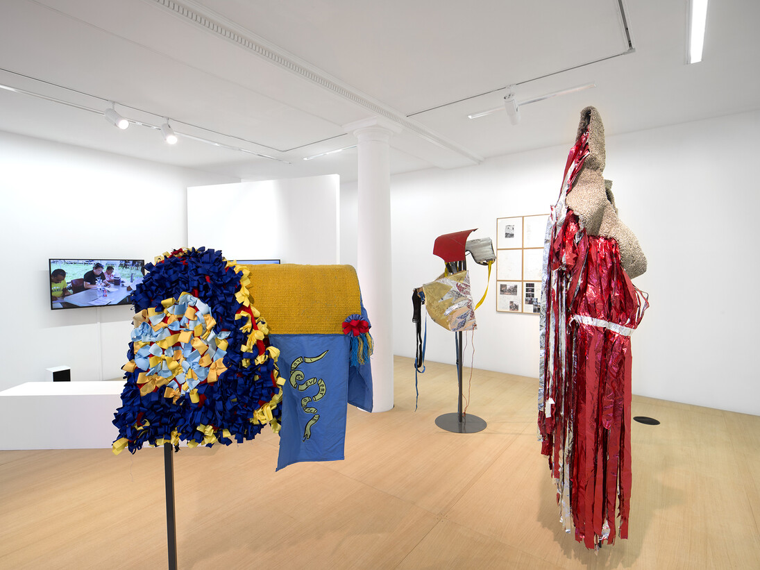 Mohamed Bourouissa, Hustling, 2015, Installation, techniques mixtes / Installation, mixed media, Dimensions variables / Variable dimensions. Costumes des chevaux par Anthony Campuzano et Kate Abercrombie en collaboration avec Mohamed Bourouissa / Horse costumes by Anthony Campuzano and Kate Abercrombie in collaboration with Mohamed Bourouissa. Horse day, 2015, Diptyque. Vidéo / Diptych. Video 13 min 28 sec. Sans titre, 2015 Installation de dessins sur papier / Installation of drawings on paper, 45 x 37 cm, Vue de l’exposition / View of the exhibition « Hustling », kamel mennour, Paris, 2015 © Mohamed Bourouissa. Photo: Julie Joubert, Courtesy the artist and kamel mennour, Paris