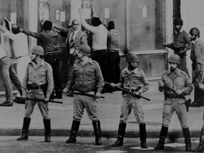 Military personnel patrol the streets of Argentina in the late 1970s, enforcing the regime’s oppressive policies and instilling fear among civilians during the dictatorship