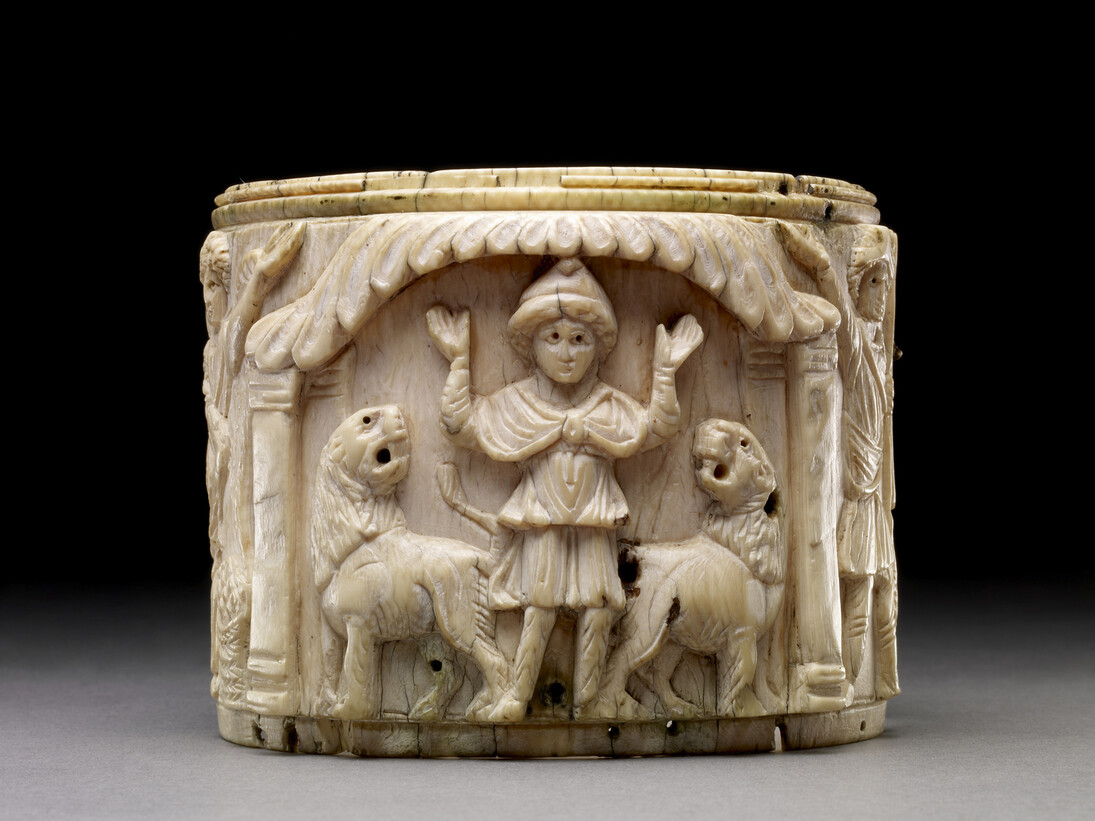 Ivory pyxis box depicting Daniel with arms raised in prayer is flanked by two lions, Egypt or Syria, 5th or early 6th century AD, © The Trustees of the British Museum