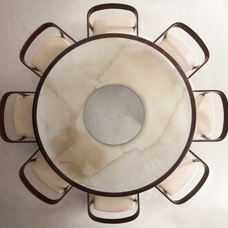 Round Dining Table and Curved Back Chairs by Joaquim Tenreiro at R & Company