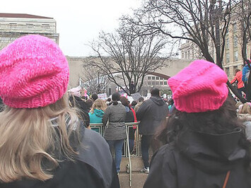 Women's March on Washington featuring two women wearing pussyhat