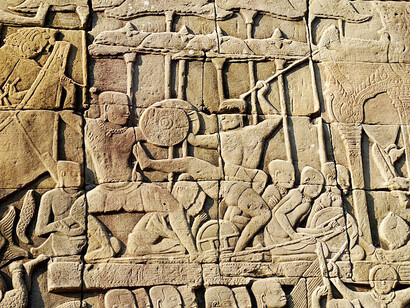 Base relief depicting the "Battle of Devas and Asuras" at the Bayon Temple in Siem Reap, Cambodia.