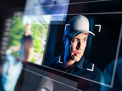 AI deepfake video editing with a person’s face, illustrating machine learning technology