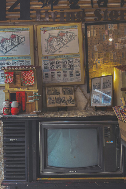 A vintage TV set and home décor bathed in warm light filtering through living room curtains, evoking nostalgia