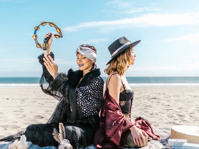 Against the backdrop of crashing waves, these women channel universal energy, embodying a profound understanding of the interconnectedness of all life