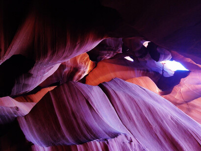 In the enchanting landscapes of Sedona, Arizona, USA, the interplay of light vortexes amidst the wind-shaped rocks creates a mesmerizing and captivating natural spectacle that never fails to fascinate visitors