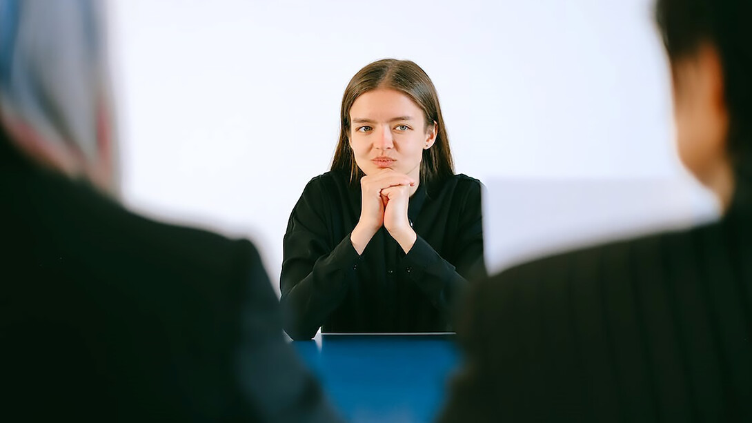 A woman who wants to get the job goes through the interview process