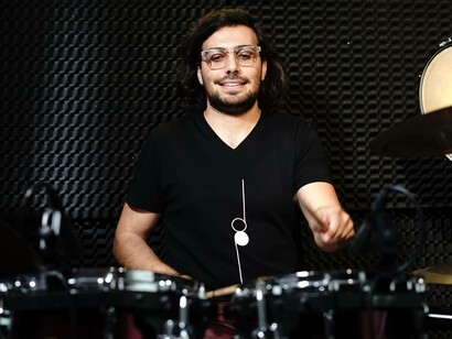 Patrick Abdo getting ready to perform on the drums