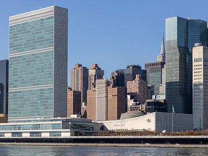 View of the East River shoreline with the Headquarters of the United Nations in New York City, USA