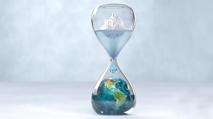 Planet earth in hourglass, polar ice caps are melting, global warming