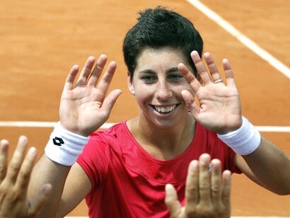Carla Suárez celebra la victoria en uno de sus partidos