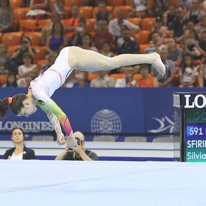 A female gymnast doing her floor exercise