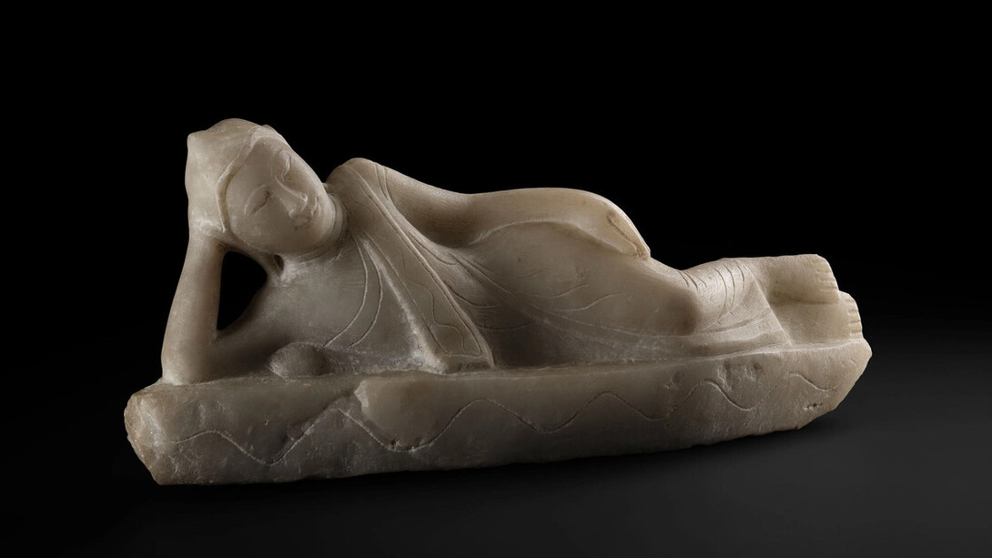 Reclining Buddha, a pose which is sometimes used to depict the death of Siddhattha Gotama. Sculptures made of alabaster became popular and were made in large quantities in mid-19th Myanmar, A.1869.17. Courtesy of National Museum of Scotland