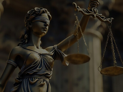 Adorned with a blindfold, Themis gracefully cradles a scale, embodying the ideals of impartiality and equitable justice in her iconic representation