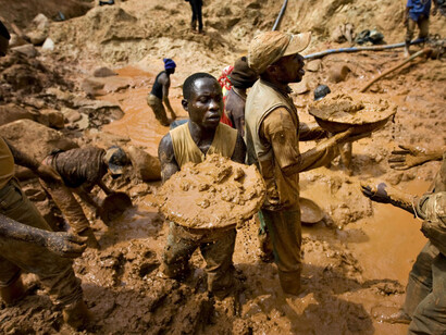 Miners  in the mining town of Pluto in Ituri Province