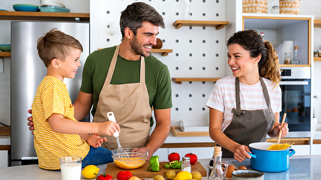 A happy family prepares a meal together in a bright kitchen, sharing the joy of home cooking