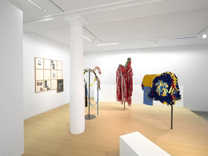 Mohamed Bourouissa, Hustling, 2015, Installation, techniques mixtes / Installation, mixed media, Dimensions variables / Variable dimensions. Costumes des chevaux par Anthony Campuzano et Kate Abercrombie en collaboration avec Mohamed Bourouissa / Horse costumes by Anthony Campuzano and Kate Abercrombie in collaboration with Mohamed Bourouissa. Horse day, 2015, Diptyque. Vidéo / Diptych. Video 13 min 28 sec. Sans titre, 2015 Installation de dessins sur papier / Installation of drawings on paper, 45 x 37 cm, Vue de l’exposition / View of the exhibition « Hustling », kamel mennour, Paris, 2015 © Mohamed Bourouissa. Photo: Julie Joubert, Courtesy the artist and kamel mennour, Paris