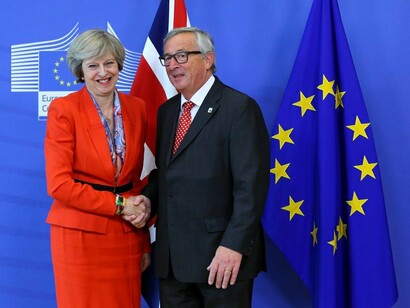 Theresa May, primera ministra de Reino Unido, y Jean-Claude Juncker, presidente de la Comisión Europea