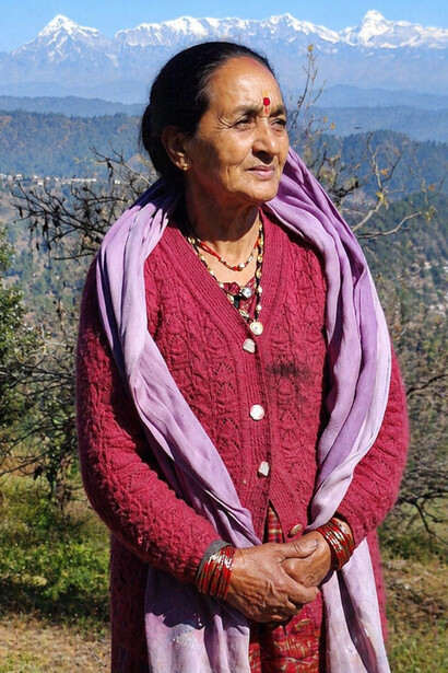 A native Kumaoni woman dressed in traditional attire from the Kumaon region of Uttarakhand, India