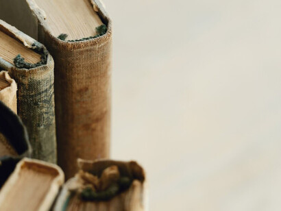 Close-up of old books with a blank background, highlighting literature