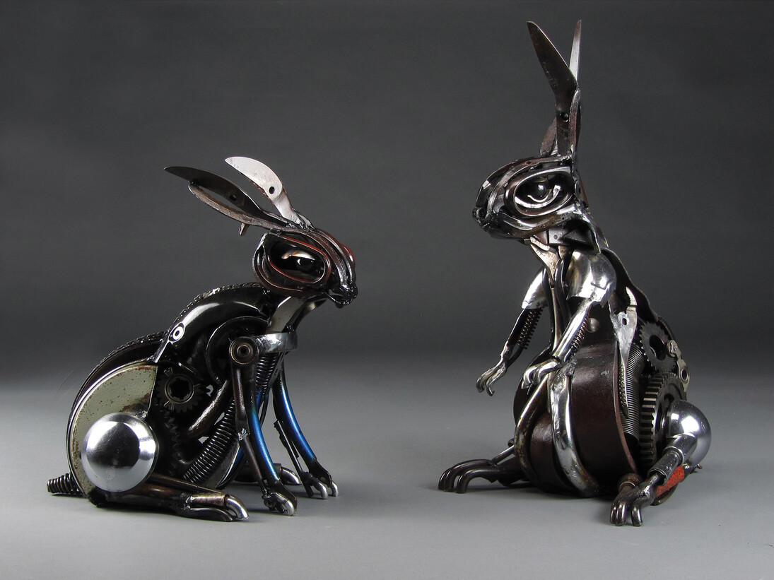 Jud Turner, ‘Blackberry the Rabbit’ (left), Welded machinery and tools, 41 x 36 x 26 cm and ‘Silver the Rabbit’ (right), Welded machinery and tools, 51 x 31 x 26 cm