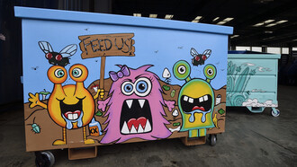 An artistically designed giant dumpster 