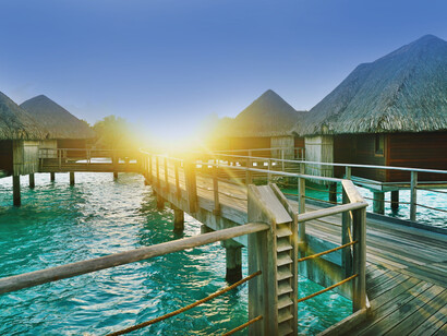 Sunsets on the bungalows over the sea