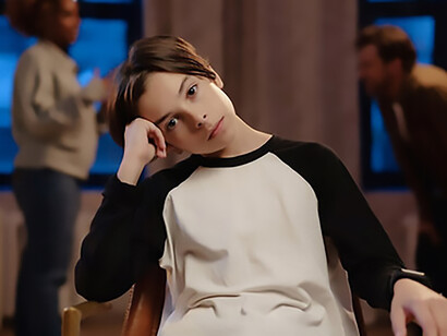 A child looks on silently as his parents argue, witnessing the exchange of hurtful words and negative communication between them