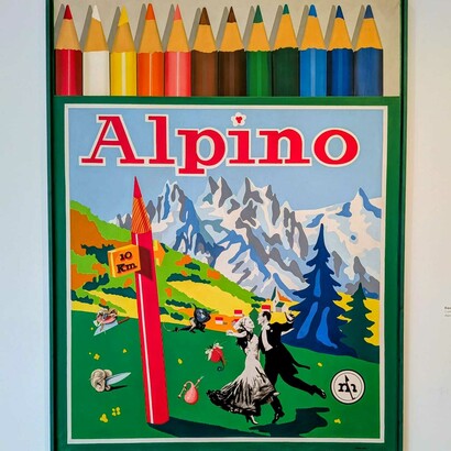 Rafael Solves and Manolo Valdés: "Alpino," (1974)is an acrylic on canvas work created in 1974 by the Spanish artistic collective Equipo Crónica. The collective was a partnership between artists Rafael Solbes and Manolo Valdés. 203 x 153.7 x 4 cm. The image depicts a large, pop-art style representation of a classic "Alpino" brand colored pencil box, a common school supply in Spain for generations. Image ©MACA/the Author 2026