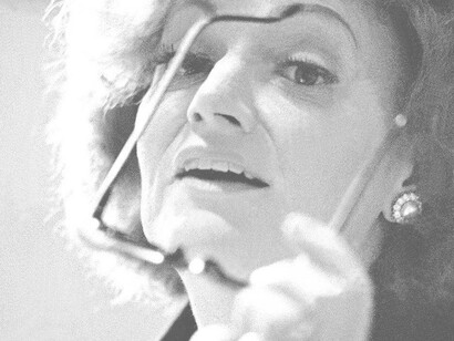 Muriel Spark captured in a moment of artistic inspiration 