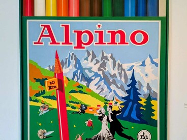 Rafael Solves and Manolo Valdés: "Alpino," (1974)is an acrylic on canvas work created in 1974 by the Spanish artistic collective Equipo Crónica. The collective was a partnership between artists Rafael Solbes and Manolo Valdés. 203 x 153.7 x 4 cm. The image depicts a large, pop-art style representation of a classic "Alpino" brand colored pencil box, a common school supply in Spain for generations. Image ©MACA/the Author 2026