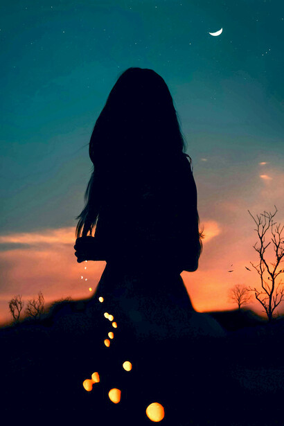 Silhouetted against the moonlit sky, a lone person looks up at the stars while a luminous path winds through the twilight landscape