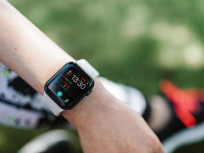 A smartwatch tracking a person’s health and activity, reflecting the growing need to safeguard health against environmental challenges