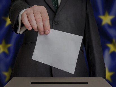 European Union election: Voters casting ballots with the EU flag in the background