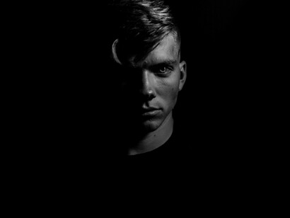 A solitary man in a black-and-white photo, embodying the struggles of loneliness, isolation, and the complexities of incel culture