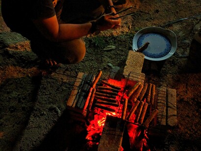 Charcoal barbeque in a campfire
