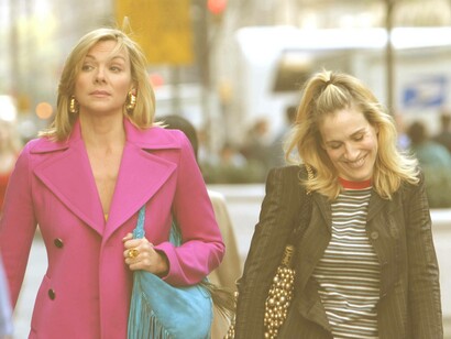 Samantha Jones and Carrie Bradshaw from the television series Sex & the City are strolling down the streets of New York City and having a wonderful time