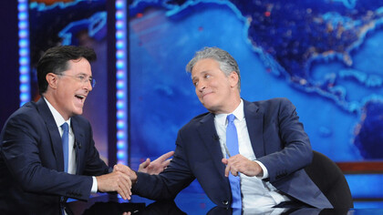 Stephen Colbert and Jon Stewart during an episode of The Daily Show