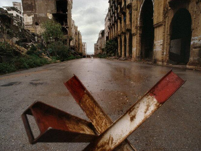 René Burri, Maarad Street. Beirut, Lebanon, 1991 © René Burri / Magnum Photos. Courtesy of Casa dei Tre Oci