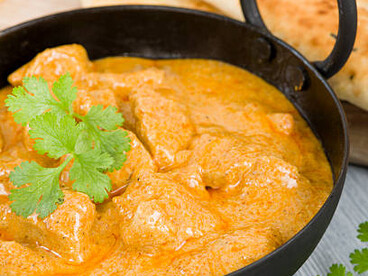 Korma is a rich, flavorful dish made by braising meat or vegetables with yogurt, water or stock, and a blend of aromatic spices to create a thick, silky gravy