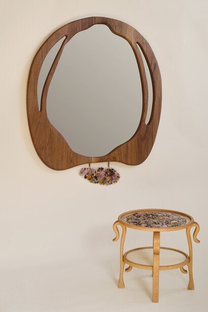 Alexis and Ginger, Scarab mirror and floral sun side table (detail). Courtesy of The Future Perfect