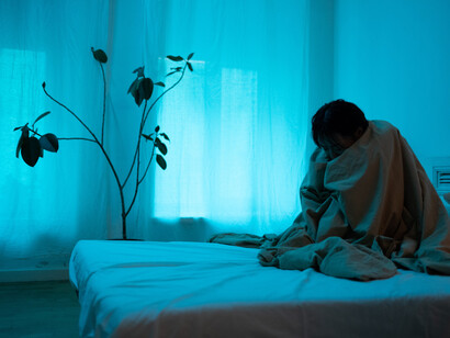 Wrapped in a blanket, staying in bed, hiding from the world