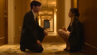 Ho-jin kneeling beside Mu-hee during one of her lowest moments, representing the true meaning of showing up when love is tested