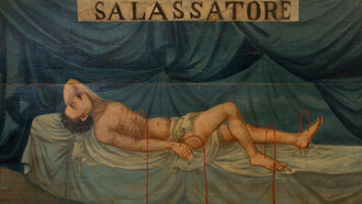 Un'insegna presente nella bottega di un barbiere