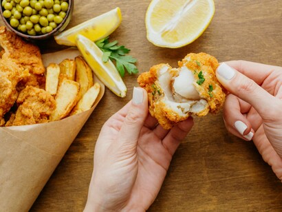 Fish and chips is a hot dish consisting of battered and fried fish, served with chips