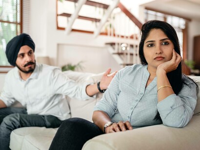 A husband trying to console his wife to save their marriage