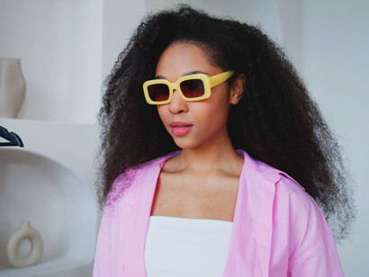 With her chic sunglasses and confident pose, she embodies the essence of modern fashion, where individuality and style intersect seamlessly