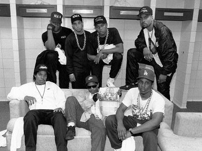 Ice Cube, Eazy-E, MC Ren. DJ Yella (front), and Dr. Dre, rapper Laylaw from Above The Law and rapper The D.O.C. (rear) poses before they head out on stage to perform at Kemper Arena in Kansas City, Missouri in June 1989