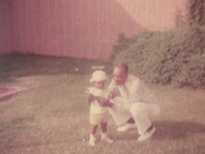 Author's father, Alonzo, with Jaha, his grandson
